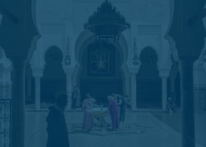 Photograph of a building featuring middle eastern architecture with a blue overlay