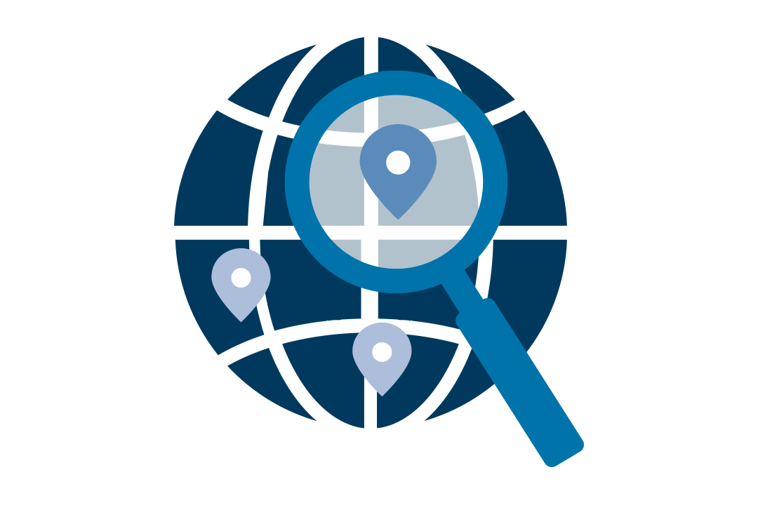 Globe with magnifying glass focused on a location mark