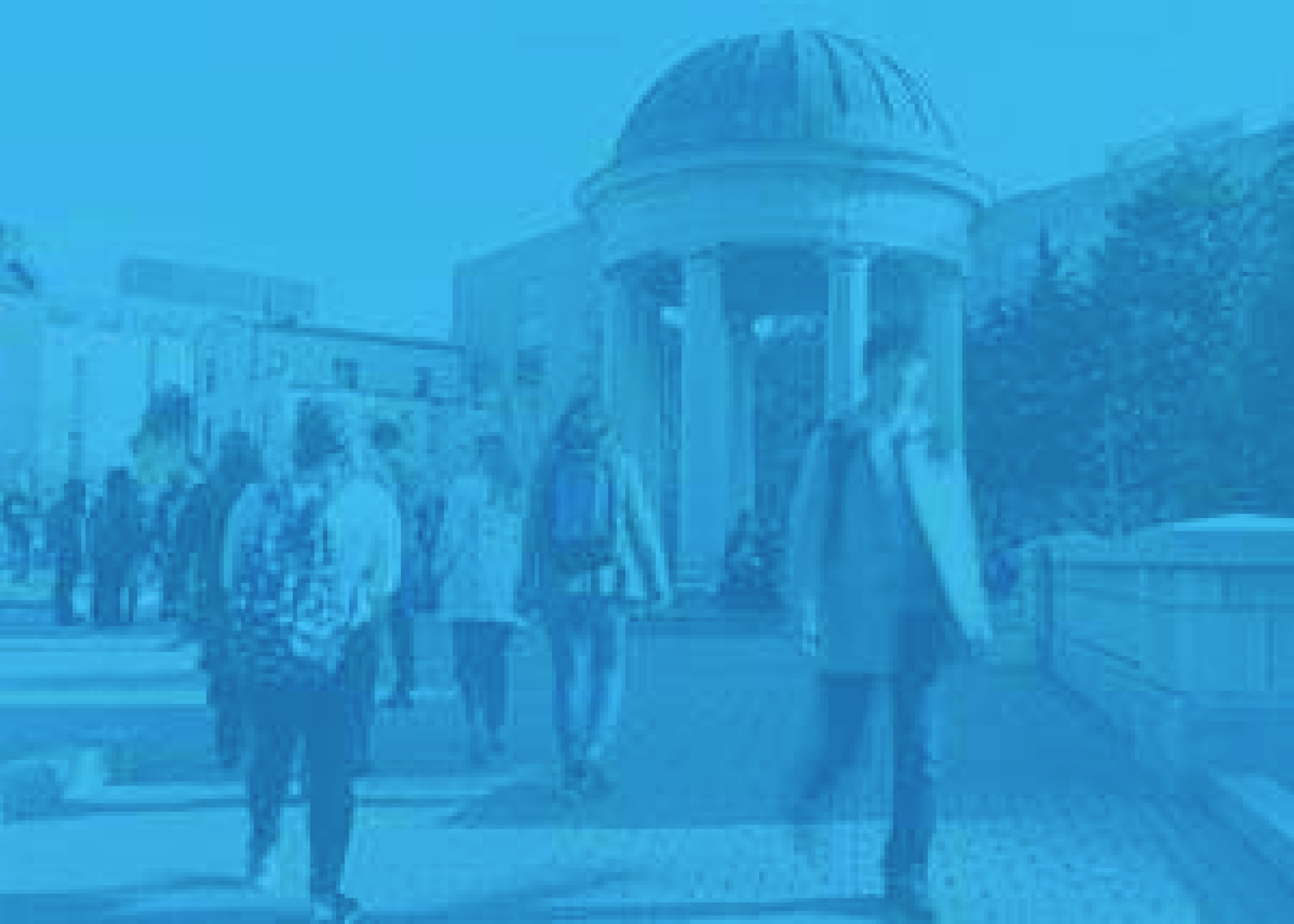 GW students walking at Kogan Plaza with light blue overlay.