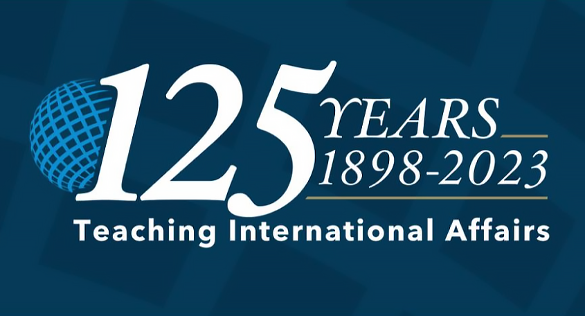 &quot;125 Years 1898-2023 Teaching International Affairs&quot; Logo for the 125th anniversary on a dark blue background.