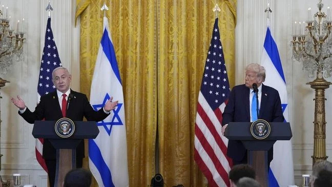 Israeli Prime Minister Benjamin Netanyahu answers questions during a news conference with President Donald Trump in the East Room of the White House, Tuesday, Feb. 4, 2025, in Washington. (AP Photo/Alex Brandon)