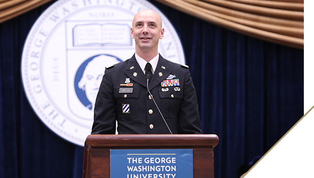 Photo: Man in military uniform giving speech