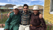 Photo: Ahman Mohibi with two other men smiling