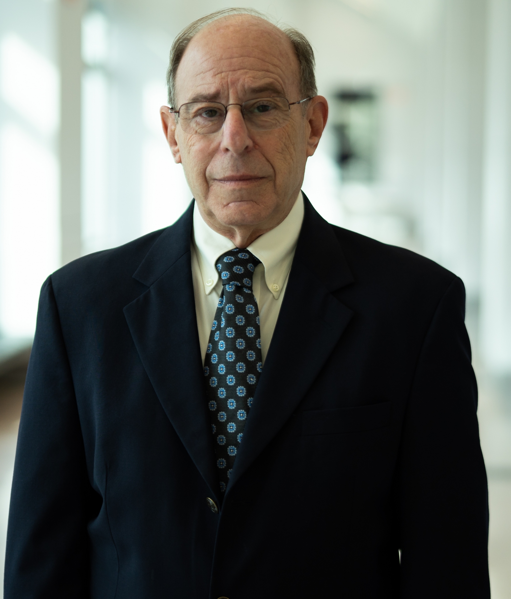 Headshot of Henry Hertzfeld