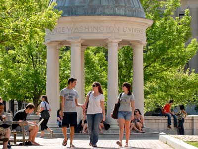 Students walk in kogan plaza