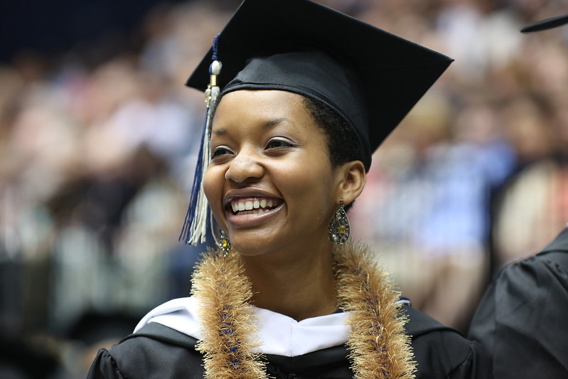 an Elliott School student smiles at graduation