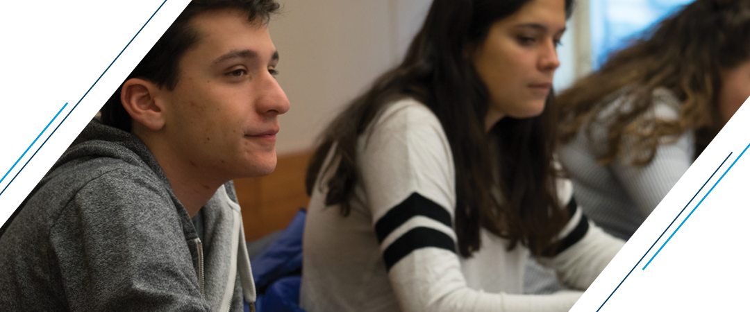 two engaged students sit in a lecture