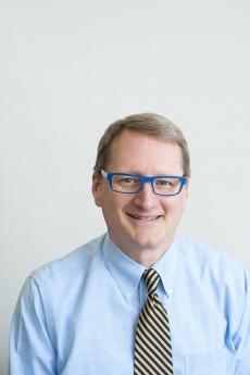 Headshot of Reid Click