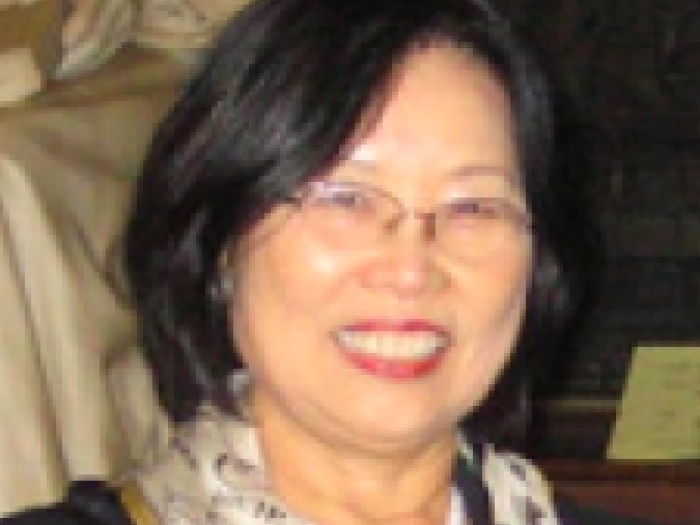 Headshot of Young-Key Kim-Renaud
