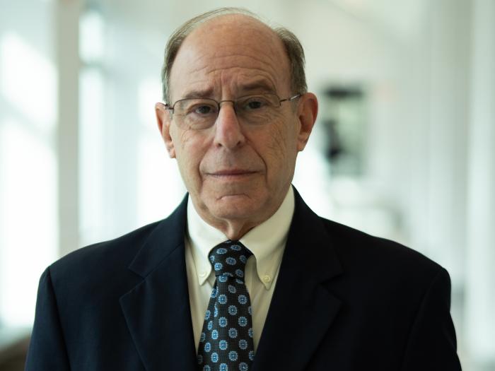 Headshot of Henry Hertzfeld