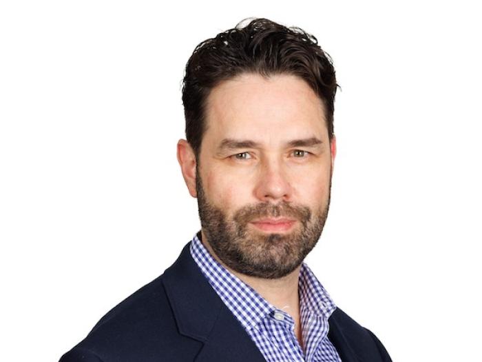 Headshot of Emmanuel Teitelbaum
