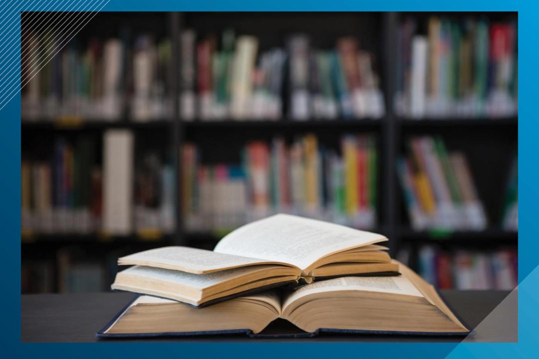 stack of books in library