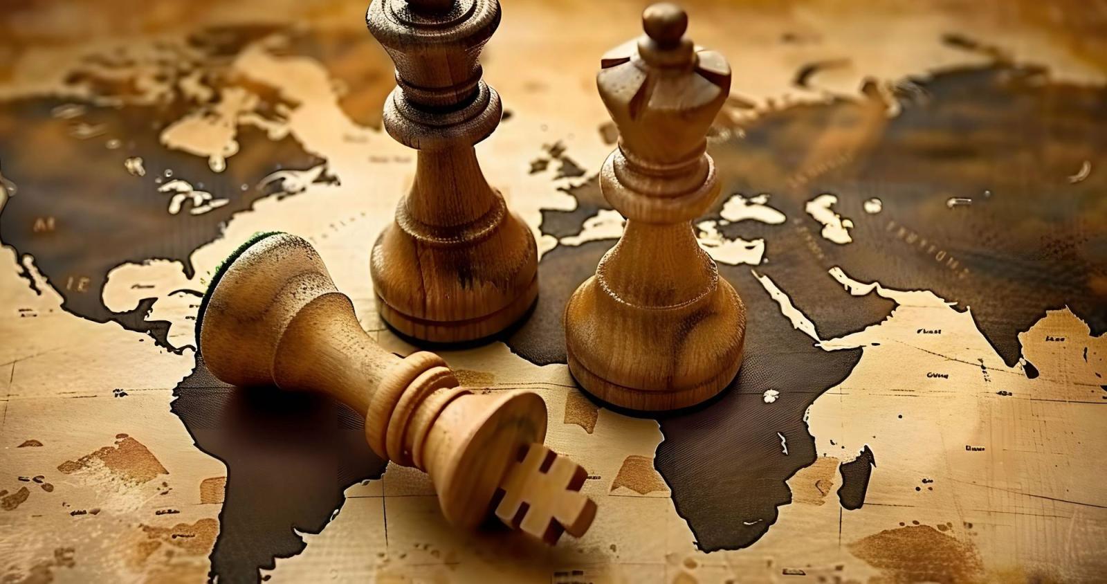 Chess pieces on top of a world map